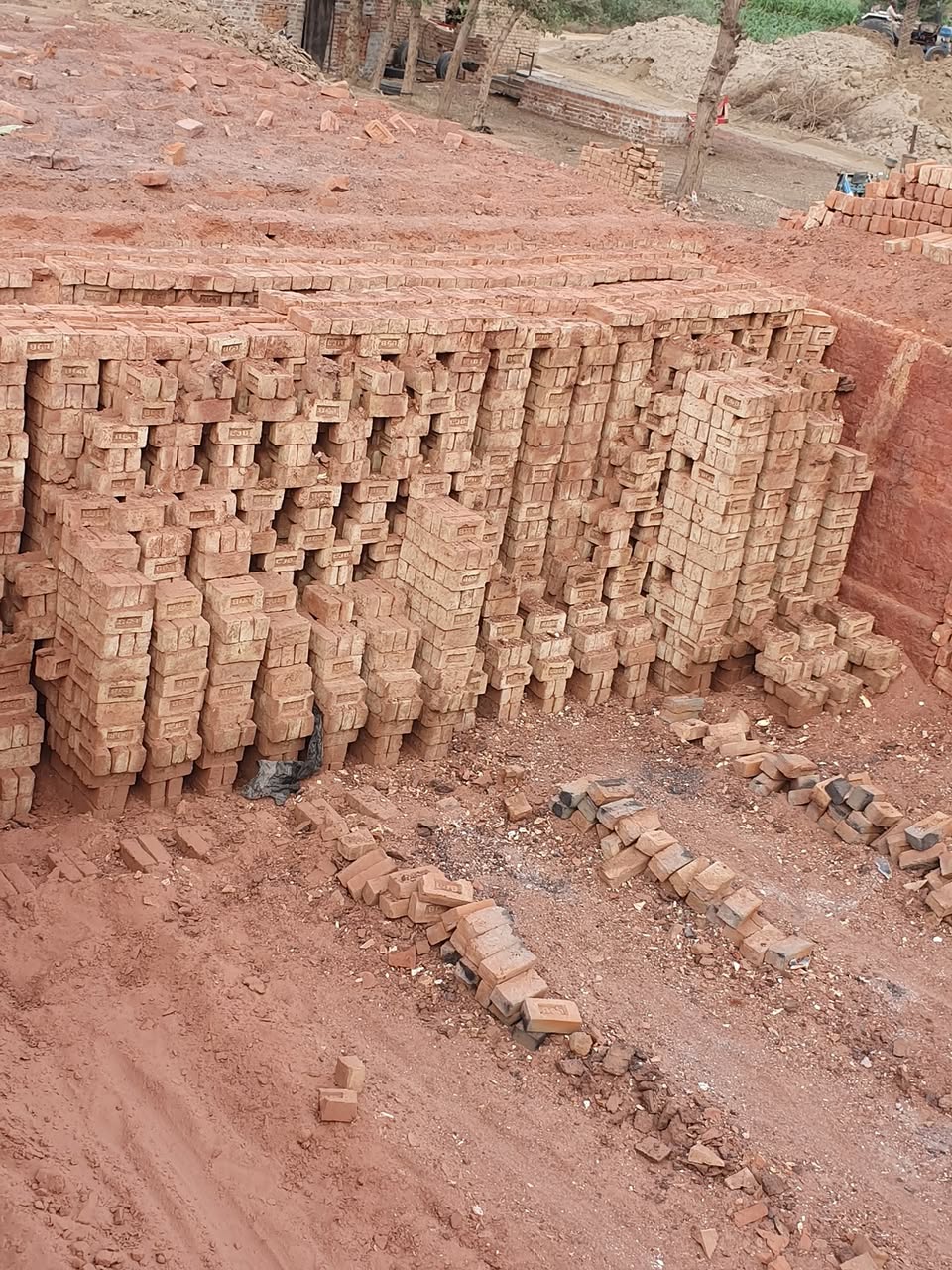 Brick yard with stacked bricks